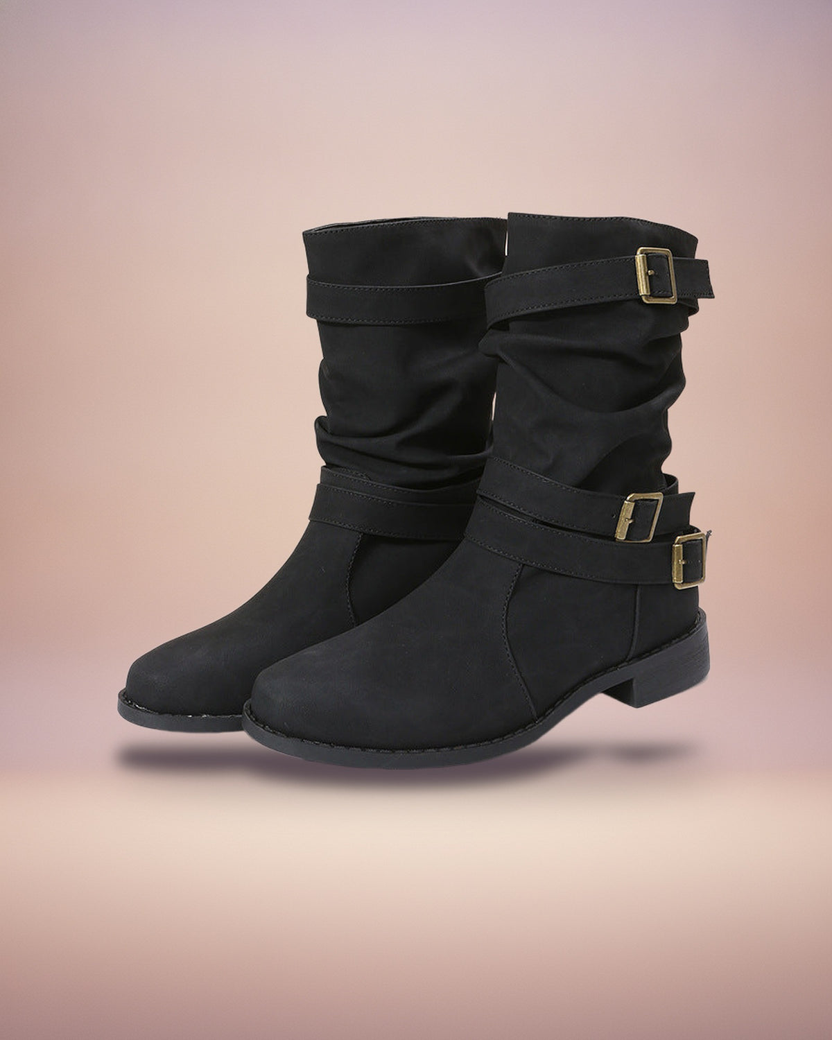 Black buckled mid-calf boots, studio view