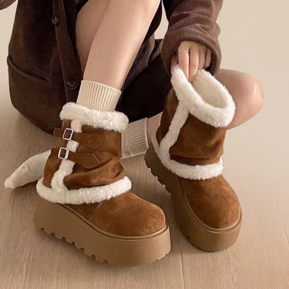 Brown plush-lined cuffable winter boots, cuff folded